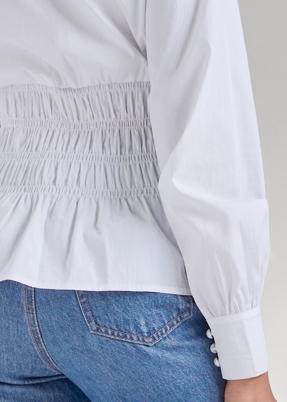 Venus Smocked Waist Peplum Blouse in White