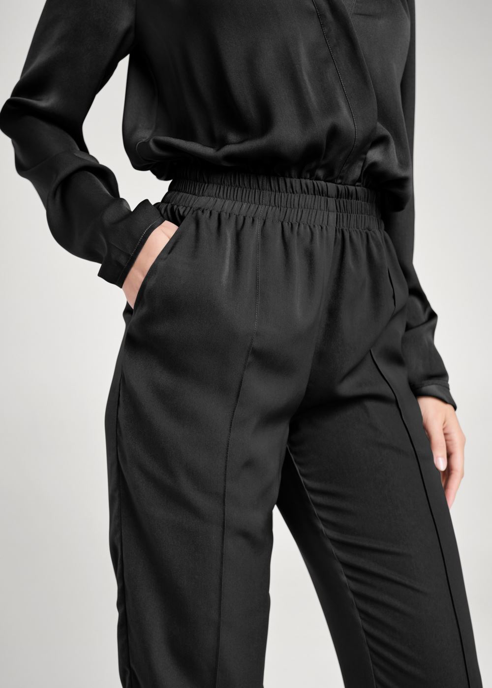Venus Plus Size Smocked Jogger Jumpsuit in Black